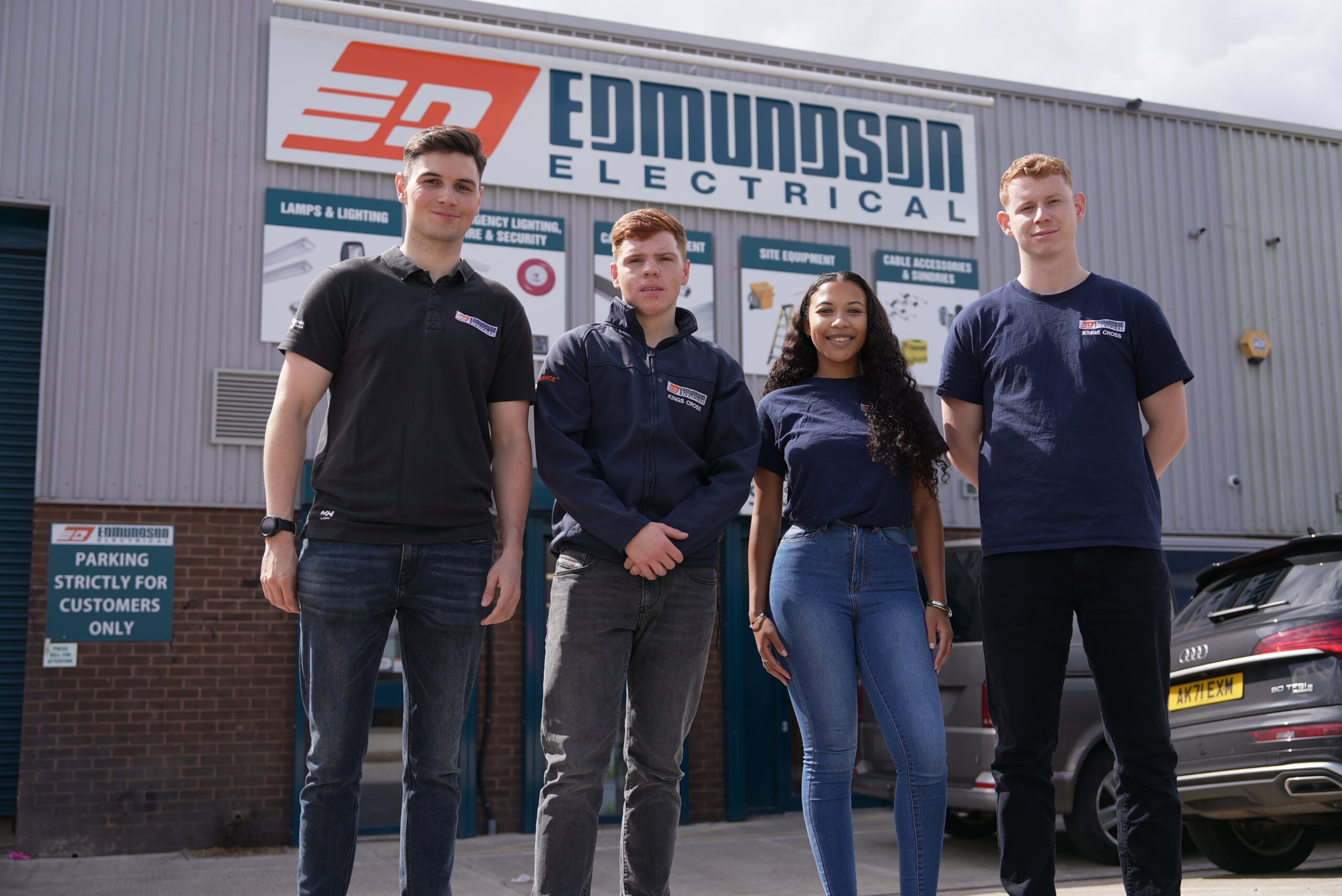 a still image of 4 people from a recruitment video